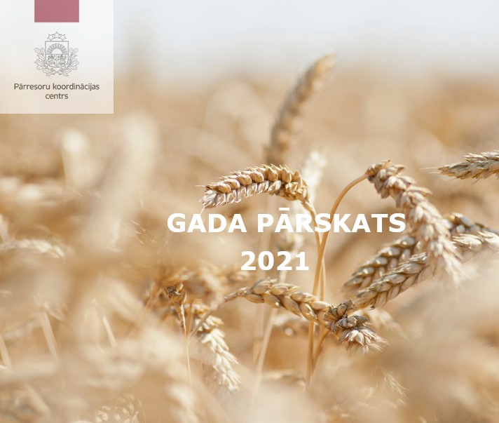 PKC 2021. gada pārskata 1. vāks, kurā attēlotas nogatavojušās vārpas ar graudiem